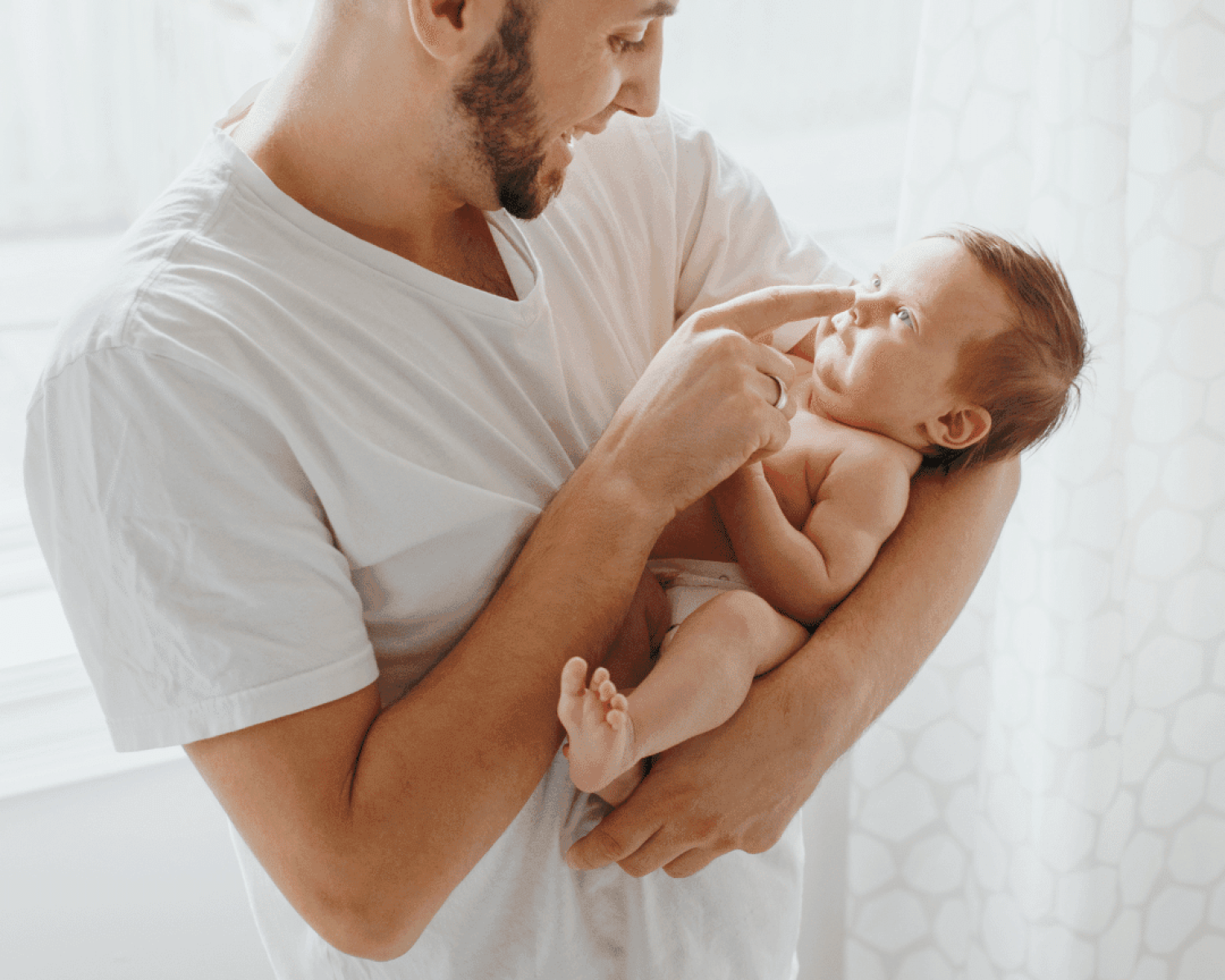 father with baby born via surrogacy